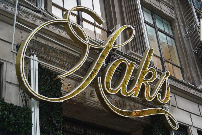 The company that owns the iconic luxury retailer Saks Fifth Avenue filed for bankruptcy late Tuesday.
The move comes after Saks Global struggled with debt it took on to buy rival Neiman Marcus, lagging department store sales and a rising online market.
It’s one of the largest retail collapses since the Covid pandemic, and casts further doubt over the future of luxury fashion.
The retailer, which also owns Bergdorf Goodman, said early Wednesday its stores would remain open for now after it finalized a $1.75 billion financing package and appointed a new CEO.
The court process is meant to give the luxury retailer room to negotiate a debt restructuring with creditors or sell itself to a new owner to stave off liquidation. Failing that, the company may be forced to shutter.
Former Neiman Marcus CEO Geoffroy van Raemdonck will replace Richard Baker, who was the architect of the acquisition strategy that left Saks Global saddled with debt.
The company also appointed former Neiman Marcus executives Darcy Penick and Lana Todorovich as chief commercial officer and chief of global brand partnerships at Saks Global, respectively.
Saks Fifth Avenue, the retail arm of Saks Global, listed $1 billion to $10 billion in assets and liabilities, according to court documents filed in U.S. Bankruptcy Court in Houston.
A retailer long loved by the rich and famous, from Gary Cooper to Grace Kelly, Saks fell on hard times after the pandemic, as competition from online outlets rose, and brands started more frequently selling items through their own stores.
The original Saks Fifth Avenue store, known for displaying the likes of Chanel, Cucinelli and Burberry, was opened by retail pioneer Andrew Saks in 1867.
The new financing deal would provide an immediate cash infusion of $1 billion through a loan from an investor group, Saks Global said.
A host of luxury brands were among the unsecured creditors, led by Chanel and Gucci owner Kering at about $136 million and $60 million respectively, the court filing said. The world’s biggest luxury conglomerate, LVMH, was listed as an unsecured creditor at $26 million. In total, Saks Global estimated there were between 10,001 and 25,000 creditors.
In 2024, Baker had masterminded the takeover of Neiman Marcus by Canada’s Hudson’s Bay Co, which had owned Saks since 2013, and later spun off the U.S. luxury assets to create Saks Global, bringing together three names that have defined American high fashion for more than a century.
The deal was designed to create a luxury powerhouse, but it saddled Saks Global with debt at a time when global luxury sales were slowing, complicating an already difficult turnaround for CEO and veteran executive Marc Metrick.
Saks Global struggled last year to pay vendors, who began withholding inventory, disrupting the company’s supply chain and leaving it with insufficient stock.
The thinly stocked shelves may have driven shoppers away to rivals like Bloomingdale’s, which posted strong sales in 2025, compounding pressure on Saks Global.
“Rich people are still buying,” Morningstar analyst David Swartz said last month, “just not so much at Saks.”
Running out of cash, Saks Global last month sold the real estate of the Neiman Marcus Beverly Hills flagship store for an undisclosed amount. It had also been looking to sell a minority stake in exclusive department store Bergdorf Goodman to help cut debt.
On Dec. 30, it failed to make an interest payment of more than $100 million to bondholders.
This post appeared first on NBC NEWS
Saks files for bankruptcy as luxury market struggles